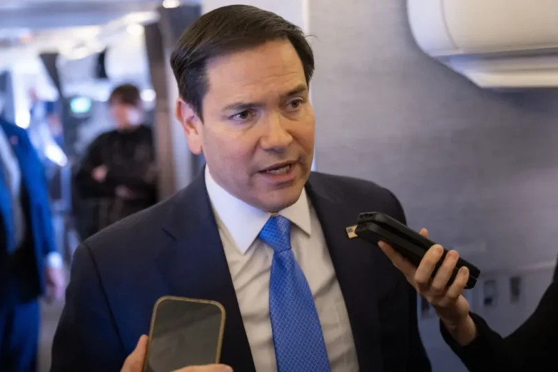 US Secretary of State Marco Rubio speaks with the media on his military airplane as he flies to Jeddah, Saudi Arabia, March 10, 2025. Rubio arrived in the Red Sea port city of Jeddah ahead of the talks with Ukrainian officials expected on March 11, leading a delegation including Mike Waltz, US President Donald Trump's national security adviser. (Photo by SAUL LOEB / POOL / AFP) (Photo by SAUL LOEB/POOL/AFP via Getty Images)