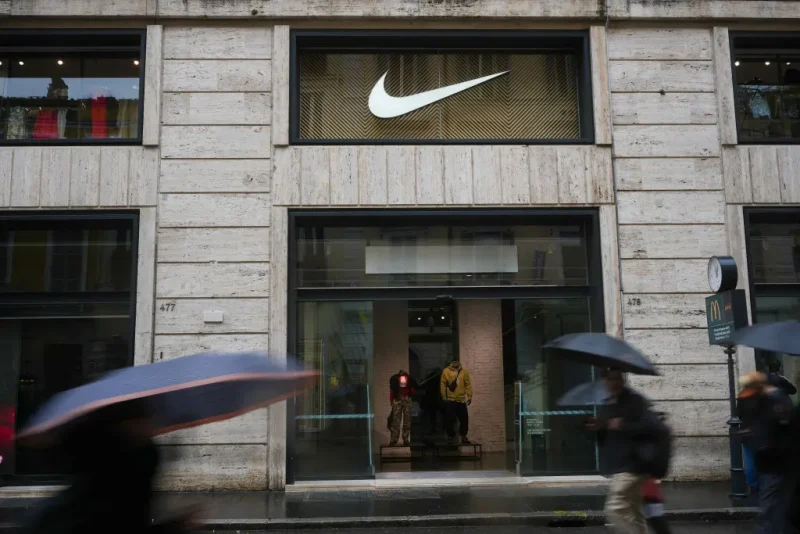 ROME, ITALY - MARCH 12: Shoppers and tourists walk past the US owned store Nike in the upmarket Via del Corso shopping area on March 12, 2025 in Rome, Italy. The European Union announced today that, from April 1, it would impose tariffs on iconic American products such as Harley-Davidson motorcycles, bourbon and jeans, in response to President Trump's imposition of global tariffs on steel and aluminium. (Photo by Christopher Furlong/Getty Images)