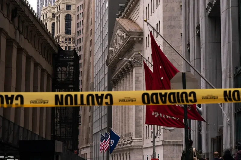 NEW YORK, NEW YORK - APRIL 15: A view of the New York Stock Exchange behind caution tape before morning trading on April 15, 2025 in New York City. U.S. stocks climbed early Tuesday as investors weighed recent updates on President Trump's tariffs, including a possible reprieve for the auto industry and a definitive move toward new duties on semiconductors and pharmaceuticals. (Photo by Adam Gray/Getty Images)