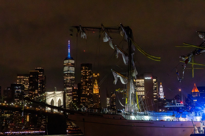 Emergency personnel respond after the Mexican Navy's tall ship Cuauhtemoc collided with the Brooklyn Bridge in New York City on May 17, 2025. The ship, which had been docked as part of a goodwill tour, struck the underside of the bridge while departing, injuring dozens. Rescue operations were launched as crew members evacuated and emergency boats arrived on scene. (Photo by Madison Swart / Hans Lucas / Hans Lucas via AFP) (Photo by MADISON SWART/Hans Lucas/AFP via Getty Images)