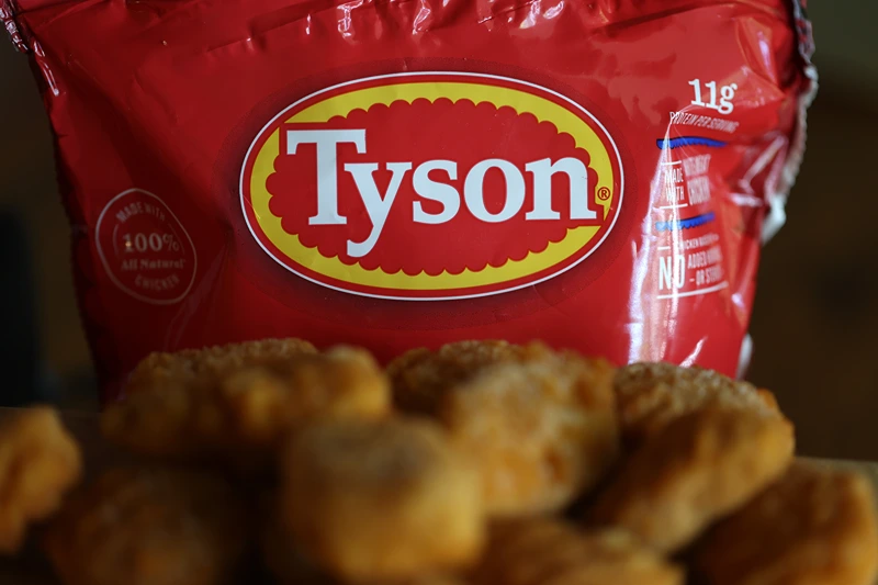 : In this photo illustration, the Tyson logo is displayed on a bag of frozen chicken nuggets on November 12, 2024 in San Anselmo, California. Tyson Foods reported fourth quarter earnings that beat analyst expectations with net sales increasing 1.6 percent to $13.57 billion, compared to an estimate of $13.39 billion. (Photo illustration by Justin Sullivan/Getty Images)