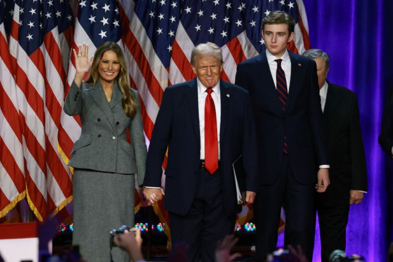 Donald Trump arrives to speak with former first lady Melania Trump and Barron Trump during an election night event at the Palm Beach Convention Center on November 06, 2024 in West Palm Beach, Florida. (Photo by Joe Raedle/Getty Images)