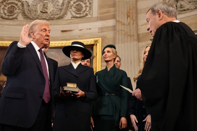 US President-elect Donald Trump takes the oath of office from US Supreme Court Chief Justice John Roberts during inauguration ceremonies in the Rotunda of the US Capitol on January 20, 2025 in Washington, DC. Donald Trump takes office for his second term as the 47th president of the United States. (Photo by CHIP SOMODEVILLA/POOL/AFP via Getty Images)