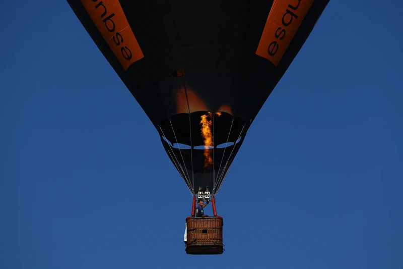 A hot air balloon is pictured during the 35th Hot Air Balloon International Festival, in Torres, Brazil, on May 03, 2025. (Photo by SILVIO AVILA / AFP) (Photo by SILVIO AVILA/AFP via Getty Images)