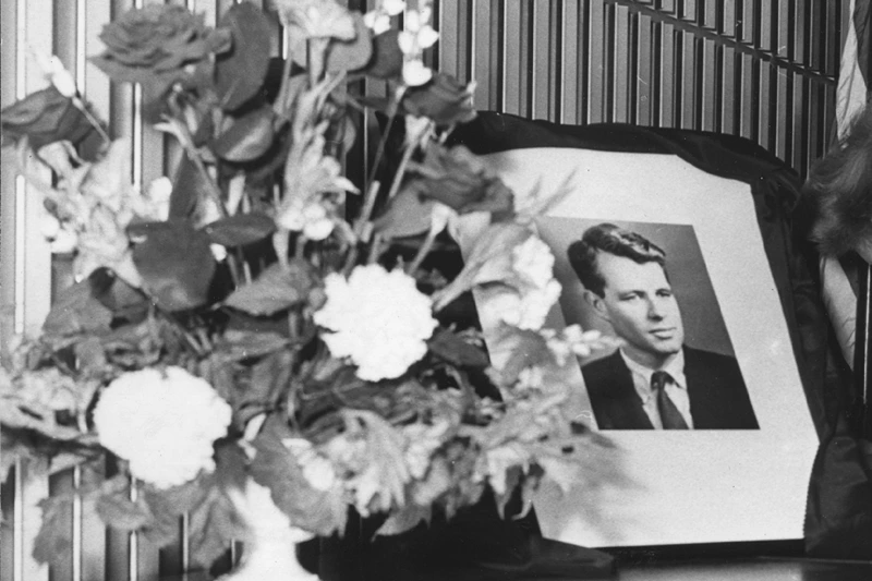 A woman signing the book of condolences for Senator Robert Kennedy at the American Embassy in London. (Photo by Michael Webb/Getty Images)