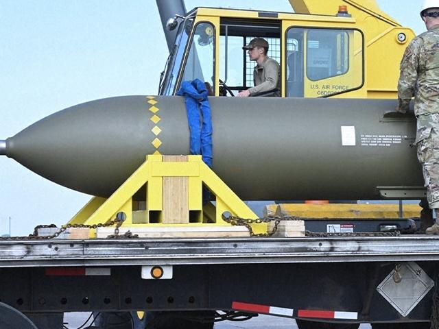 Military handout photo of airmen looking at a GBU-57, the Massive Ordnance Penetrator bomb (Photo via AP)