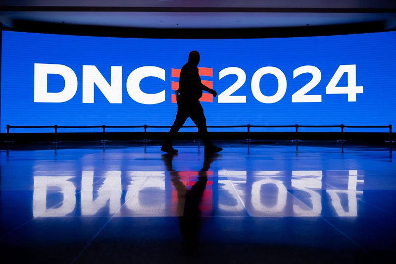 A worker walks through the concourse as preparations are made ahead of the Democratic National Convention (DNC) at the United Center in Chicago, Illinois, on August 17, 2024. Vice President Kamala Harris will formally accept the party's nomination for president at the DNC which runs from August 19-22 in Chicago. (Photo by SAUL LOEB / AFP) (Photo by SAUL LOEB/AFP via Getty Images)
