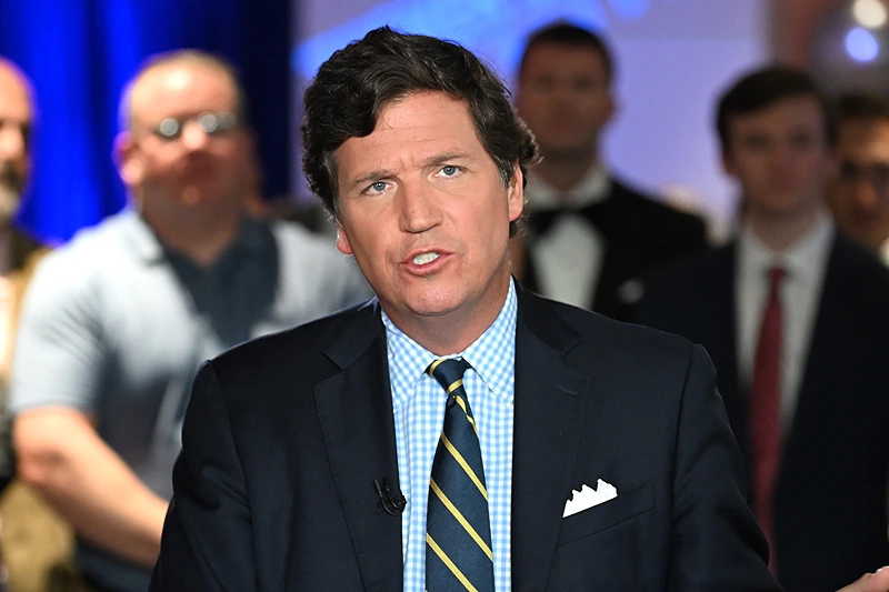 HOLLYWOOD, FLORIDA - NOVEMBER 17: Tucker Carlson speaks during 2022 FOX Nation Patriot Awards at Hard Rock Live at Seminole Hard Rock Hotel & Casino Hollywood on November 17, 2022 in Hollywood, Florida. (Photo by Jason Koerner/Getty Images)