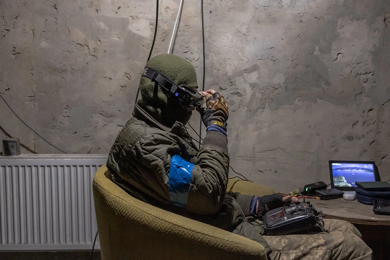 Ukrainian serviceman Said, a member of the Achilles Battalion of the 92nd Assault Brigade operates an FPV suicide drone flying towards Russian positions, in the Kharkiv region, on May 16, 2024, amid the Russian invasion of Ukraine. (Photo by Roman PILIPEY / AFP) (Photo by ROMAN PILIPEY/AFP via Getty Images)