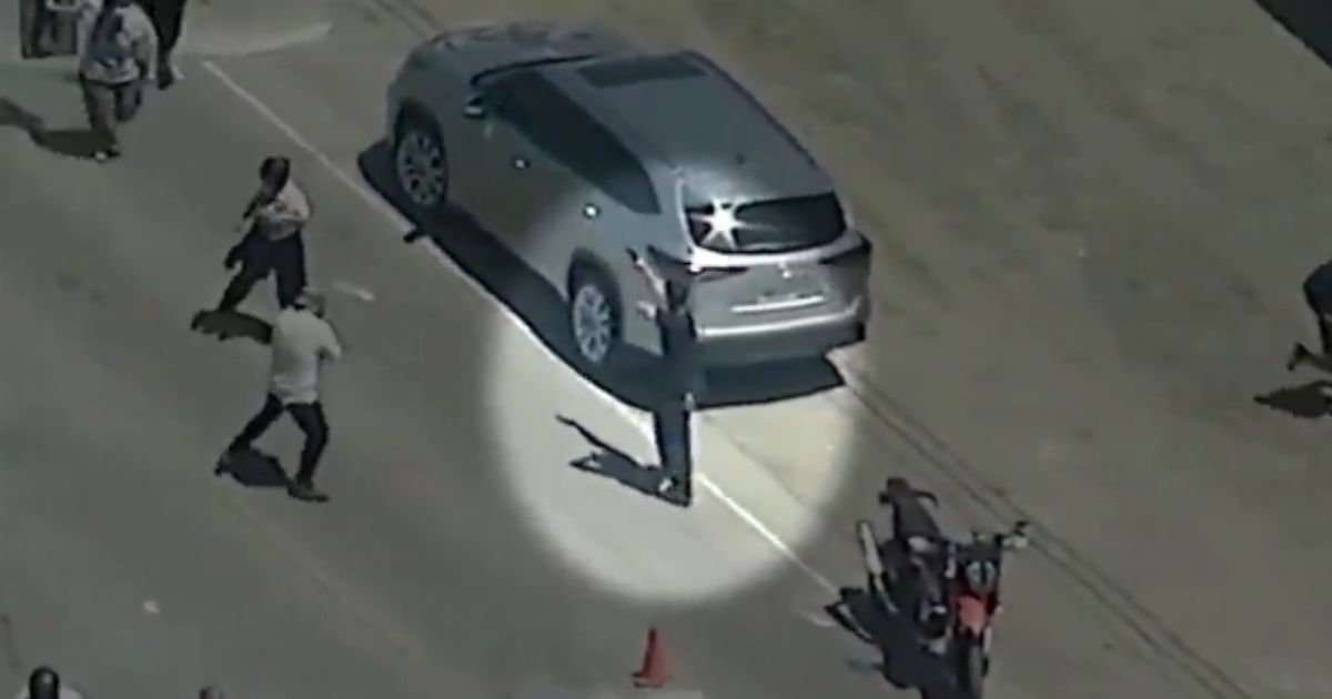 During an ICE raid in Camarillo, California, on Thursday, protesters gathered, with one, center, shooting at agents.