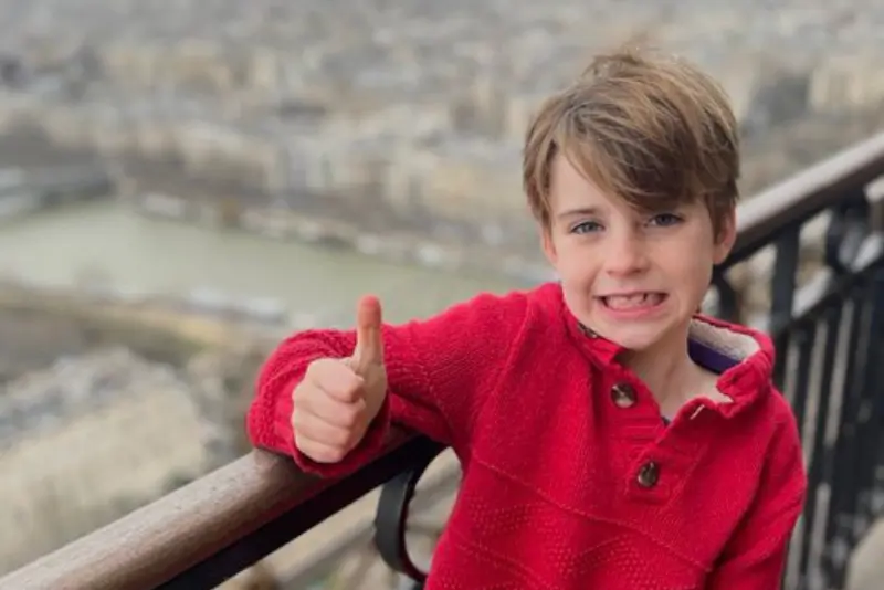 Fletcher Merkel, age 8, was one of the two people killed in Wednesday’s shooting, which also injured 18 as shots broke out during a morning Mass service (Merkel Family)