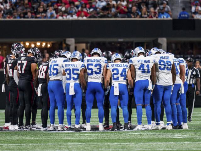PHOTO: Members of the Atlanta Falcons and Detroit Lions gather at midfield during the second half of an NFL preseason football game, Friday, Aug. 8, 2025, in Atlanta. (AP Photo/Danny Karnik)
