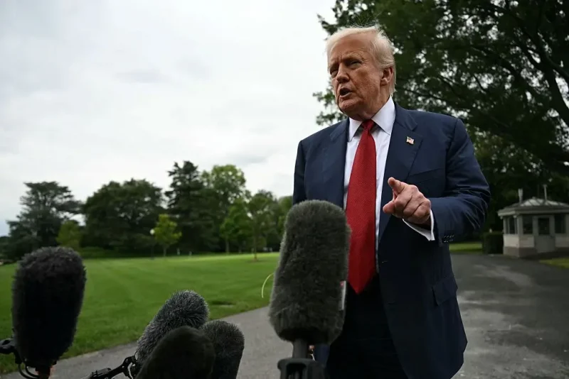 US President Donald Trump speaks to the press before boarding Marine One on the South Lawn of the White House in Washington, DC, on August 1, 2025. Trump is travelling to New Jersey to spend the weekend at his Bedminster residence. (Photo by Jim WATSON / AFP) (Photo by JIM WATSON/AFP via Getty Images)