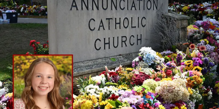 Flowers are seen outside the Annunciation Catholic Church in Minneapolis, Minnesota, on September 3, 2025, as the US vice president and second lady pay their respects at the site. On August 27 a shooter opened fire on school children attending a church service in Minneapolis, killing two pupils and wounding 17 people in the latest violent tragedy to jolt the United States. (Photo by Alex WROBLEWSKI / POOL / AFP) (Photo by ALEX WROBLEWSKI/POOL/AFP via Getty Images)