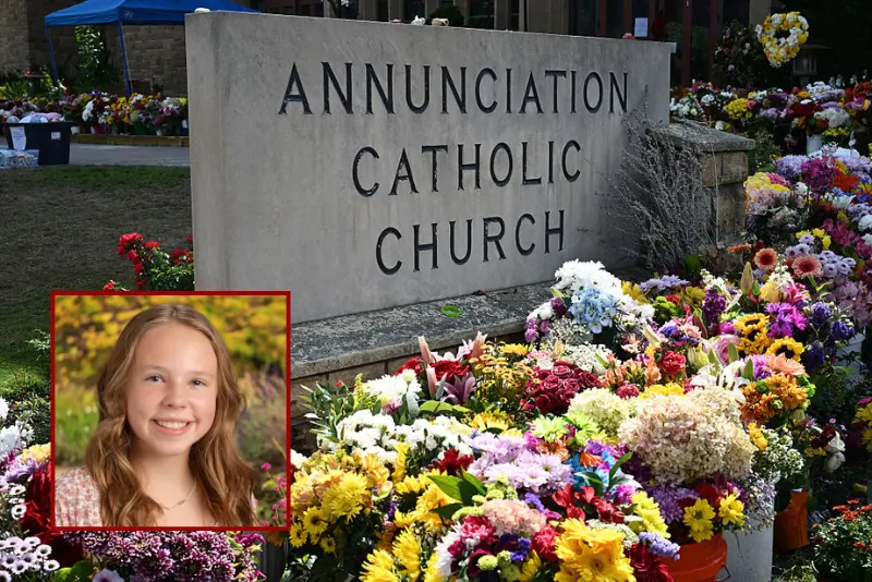 Flowers are seen outside the Annunciation Catholic Church in Minneapolis, Minnesota, on September 3, 2025, as the US vice president and second lady pay their respects at the site. On August 27 a shooter opened fire on school children attending a church service in Minneapolis, killing two pupils and wounding 17 people in the latest violent tragedy to jolt the United States. (Photo by Alex WROBLEWSKI / POOL / AFP) (Photo by ALEX WROBLEWSKI/POOL/AFP via Getty Images)