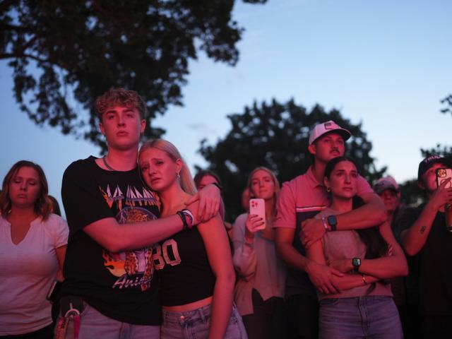PHOTO: Utah Valley University students embrace during a vigil on Sept. 11, 2025, for Charlie Kirk, the CEO and co-founder of Turning Point USA who was shot and killed in Orem, Utah. (AP Photo/Lindsey Wasson)