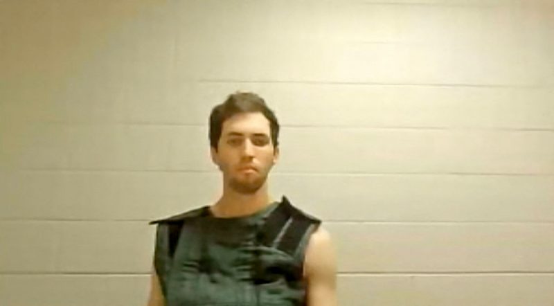 This screengrab from the Utah Court live streaming shows Tyler Robinson, the suspect in the killing of political activist Charlie Kirk, attending a court appearance remotely from his jail cell in Provo, Utah, on September 16, 2025. Robinson has been formally charged with the murder of Kirk, and the prosecution added a notice of intent to seek the death penalty. Six other charges include obstruction of justice and witness tampering. Kirk, a close ally of President Donald Trump, was shot dead last week during a speaking event on a Utah university campus. (Photo by POOL / AFP) (Photo by -/POOL/AFP via Getty Images)