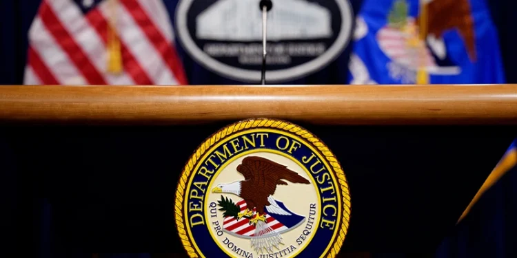 WASHINGTON, DC - MAY 6: The Department of Justice seal and logo are displayed before U.S. Attorney General Pam Bondi arrives for a news conference at the Department of Justice on May 6, 2025 in Washington, DC. The Justice Department along with the Drug Enforcement Administration (DEA) and the U.S. Attorney