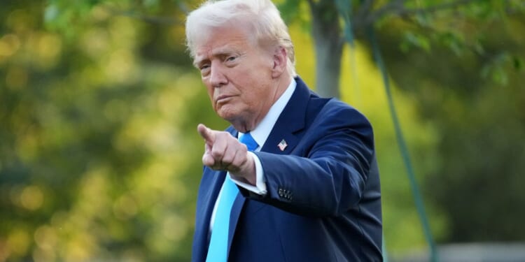 President Donald Trump gestures as he departs the White House in Washington, D.C., on Monday.