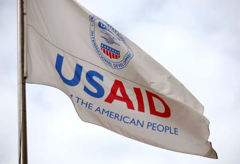 A flag outside of the U.S. Agency for International Development (USAID) headquarters is seen on February 03, 2025 in Washington, DC. Elon Musk, tech billionaire and head of the Department of Government Efficiency (DOGE), saaid in a social media post that he and U.S. President Doanld Trump will shut down foreign assistance agency. (Photo by Kevin Dietsch/Getty Images)