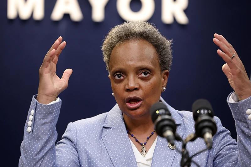 CHICAGO, ILLINOIS - MAY 09: Chicago Mayor Lori Lightfoot announces that she has declared a state of emergency to help deal with an influx of migrants during a press conference on May 09, 2023 in Chicago, Illinois. According to the mayor, 100 to 200 migrants are arriving in the city each day. (Photo by Scott Olson/Getty Images)