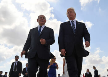 Israeli Prime Minister Benjamin Netanyahu speaks with President Donald Trump in Tel Aviv on May 23