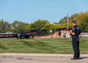 GRAND BLANC, MICHIGAN - SEPTEMBER 28: The burned church as emergency services respond to a shooting and fire at the Church of Jesus Christ of Latter-day Saints on September 28, 2025 in Grand Blanc, Michigan. Police said there are multiple victims and the shooter is down. (Photo by Bill Pugliano/Getty Images)