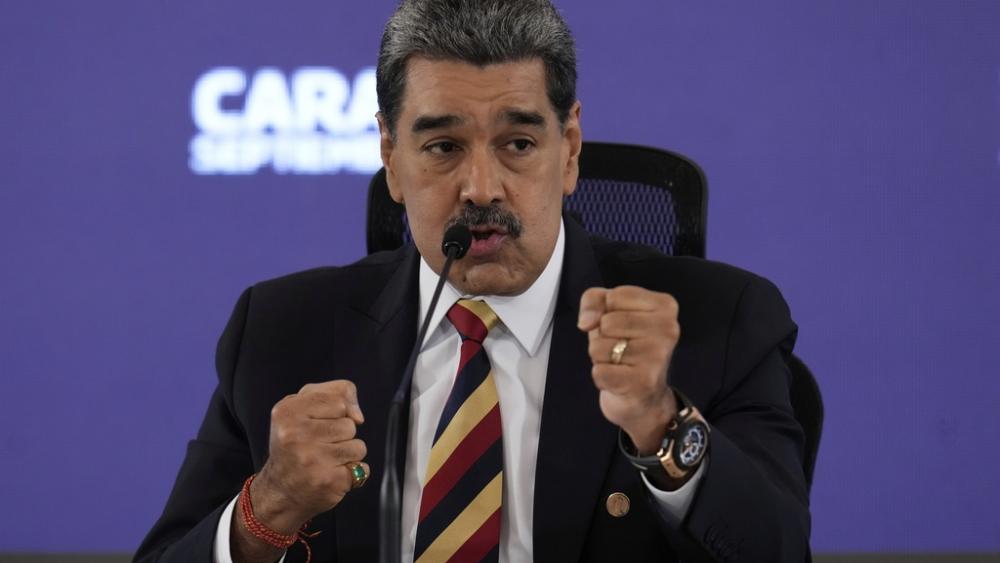 President Nicolas Maduro gives a press conference in Caracas, Venezuela, Monday, Sept. 1, 2025. (AP Photo/Ariana Cubillos)