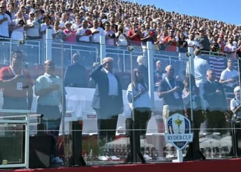 U.S. President Donald Trump, along with his granddaughter Kai Madison Trump, attends the 2025 Ryder Cup at Black Course at Bethpage State Park Golf Course on September 26, 2025 in Farmingdale, New York. In his second term, Trump has attended several major sporting events. (Photo by Mandel Ngan-Pool/Getty Images)