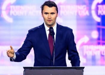 Charlie Kirk speaks on stage at America Fest 2024 in Phoenix, Arizona, on Dec. 22, 2024.