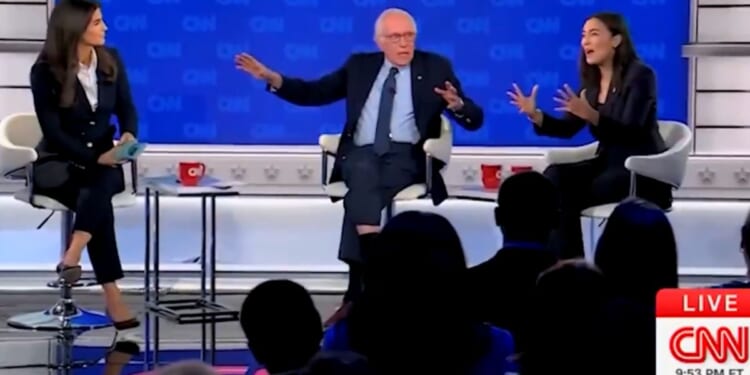 The more New York Rep. Alexandria Ocasio-Cortez, right, and Vermont Sen. Bernie Sanders protested about CNN host Kaitlan Collins' question, the more it sounded like a sure thing that AOC will run against fellow Democrat Sen. Chuck Schumer.
