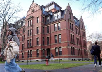 Students walk on the campus of Harvard University in Cambridge, Massachusetts, on Dec. 17, 2024.