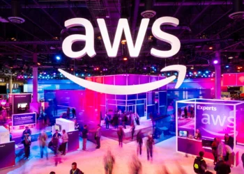 LAS VEGAS, NEVADA - NOVEMBER 28: Attendees walk through an expo hall at AWS re:Invent 2023, a conference hosted by Amazon Web Services, at The Venetian Las Vegas on November 28, 2023 in Las Vegas, Nevada. (Photo by Noah Berger/Getty Images for Amazon Web Services)