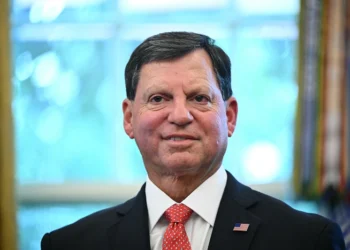 Commissioner of the Social Security Administration Frank Bisignano looks on as US President Donald Trump speaks prior to signing a presidential proclamation honoring the 90th anniversary of the Social Security Act in the Oval Office of the White House in Washington, DC on August 14, 2025. (Photo by Mandel NGAN / AFP) (Photo by MANDEL NGAN/AFP via Getty Images)