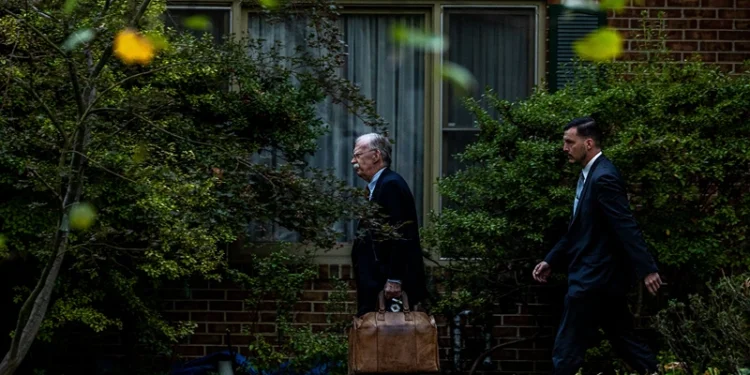 BETHESDA, MARYLAND - OCTOBER 17: John Bolton leaves his home on October 17, 2025 in Bethesda, Maryland. Former national security adviser Bolton was indicted by a federal grand jury on Thursday. (Photo by Alex Kent/Getty Images)