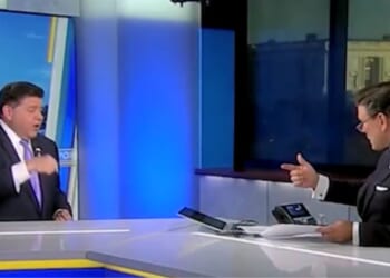 On Thursday, Fox News' Bret Baier, right, challenged Illinois Gov. JB Pritzker, left, over Chicago's murder rate and displayed a map to prove the governor wrong.