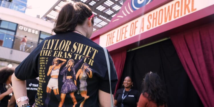 Taylor Swift fans await entry to a TikTok/Taylor Swift fan activation pop-up event Friday to celebrate the release of her latest album "The Life of a Showgirl," in Los Angeles.