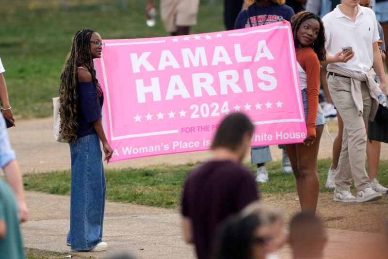WASHINGTON, DC - NOVEMBER 06: Supporters hold up a sign for Democratic presidential nominee, U.S. Vice President Kamala Harris as they wait to hear her speak at Howard University on November 06, 2024 in Washington, DC. After a contentious campaign focused on key battleground states, the Republican presidential nominee, former U.S. President Donald Trump was projected to secure the majority of electoral votes, giving him a second term as U.S. President. Republicans also secured control of the Senate for the first time in four years. (Photo by Kent Nishimura/Getty Images)