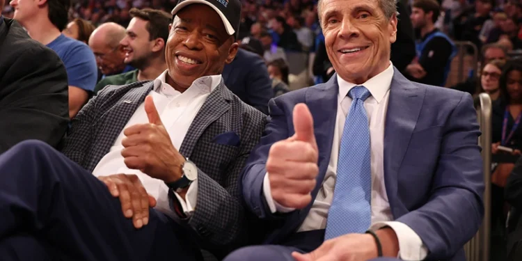 NEW YORK, NEW YORK - OCTOBER 22: New York Mayor Eric Adams poses with Independent candidate former New York Gov. Andrew Cuomo after Cuomo participated in the second debate for the upcoming mayoral election on Wednesday evening during the game between the New York Knicks and the Cleveland Cavaliers at Madison Square Garden on October 22, 2025 in New York City. NOTE TO USER: User expressly acknowledges and agrees that, by downloading and or using this photograph, User is consenting to the terms and conditions of the Getty Images License Agreement. (Photo by Al Bello/Getty Images)