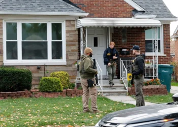 Members of the FBI Joint Terrorism Task Force search a home in Dearborn, Michigan, on October 31, 2025. FBI Director Kash Patel said Friday that the agency had thwarted a "potential terrorist attack" planned in the northern state of Michigan over Halloween weekend. Patel said the FBI arrested multiple subjects. (Photo by JEFF KOWALSKY / AFP) (Photo by JEFF KOWALSKY/AFP via Getty Images)