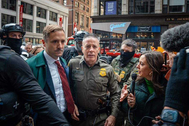 CHICAGO, ILLINOIS - OCTOBER 28: U.S. Border Patrol commander Gregory Bovino pushes through a crowd of media and protesters as he enters the Dirksen Federal Building on October 28, 2025, in Chicago, Illinois. Bovino is appearing before U.S. District Judge Sara Ellis amid accusations that he and agents under his command have defied court limits on tear gas and other crowd control tactics during President Donald Trump's Operation Midway Blitz enforcement surge across Chicago and the suburbs. (Photo by Jamie Kelter Davis/Getty Images)