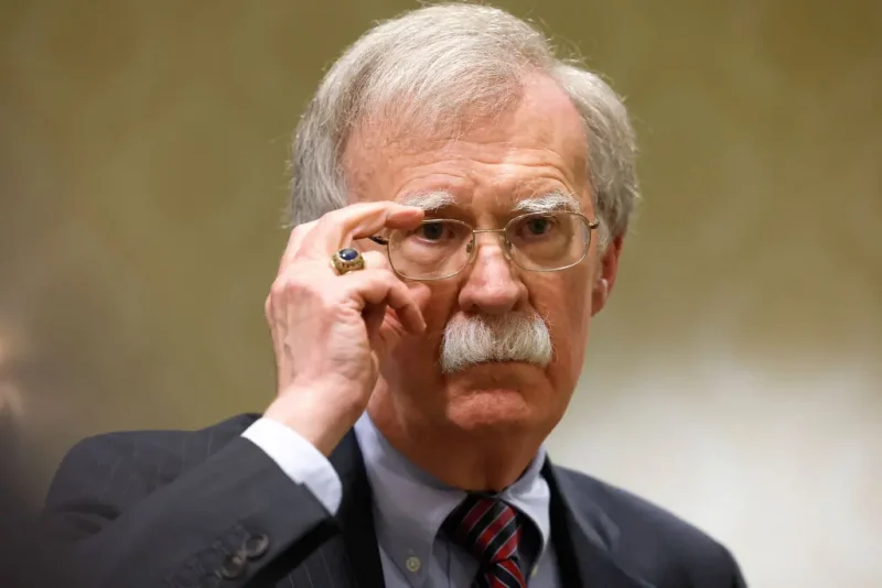 WASHINGTON, DC - AUGUST 17: Former National Security Adviser John Bolton speaks to reporters after speaking in a panel hosted by the National Council of Resistance of Iran – U.S. Representative Office (NCRI-US) at the Willard InterContinental Hotel on August 17, 2022 in Washington, DC. The NCRI-US held the panel to mark the 20th anniversary of their first press conference on the perceived threat of Iran’s nuclear weapons program. Recently the U.S. Justice Department announced charges against an Iranian operative for a plot to murder John Bolton. (Photo by Anna Moneymaker/Getty Images)
