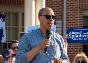 Jay Jones, who is running to become Virginia's attorney general in 2025, speaks to the audience during Abigail Spanberger's bus tour stop at Stacy C. Sherwood Community Center in Fairfax, Virginia, on June 26, 2025.