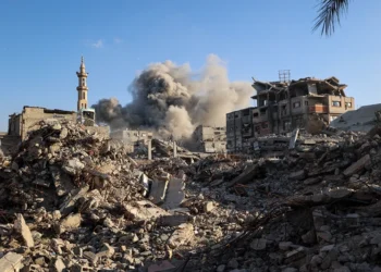 TOPSHOT - Smoke billows following an Israeli strike that targeted a building in the Bureij camp for Palestinian refugees in the central Gaza Strip on October 19, 2025. Gaza