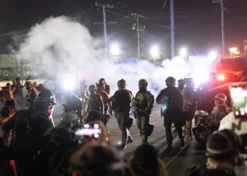BROADVIEW, ILLINOIS - SEPTEMBER 27: Federal law enforcement agents attack demonstrators protesting outside of an immigrant processing center with a barrage of tear gas and pepper balls on September 27, 2025 in Broadview, Illinois. The demonstrators were protesting a recent surge in ICE apprehensions in the Chicago area, part of a push by the Trump administration dubbed Operation Midway Blitz. (Photo by Scott Olson/Getty Images)