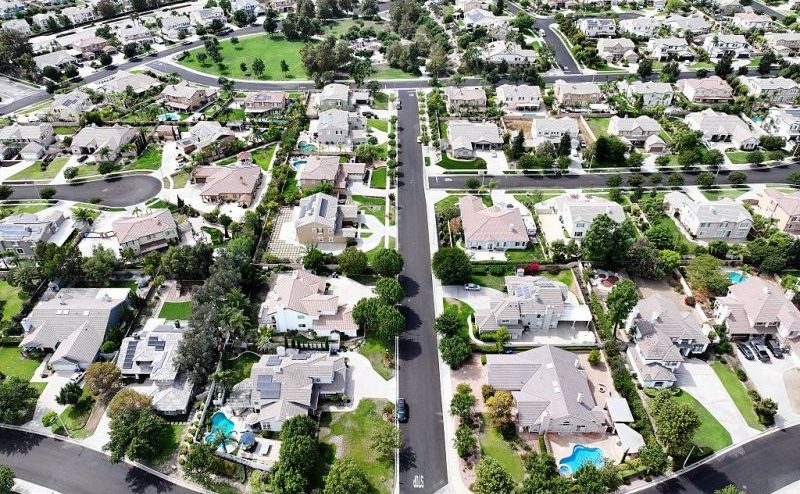RANCHO CUCAMONGA, CALIFORNIA - SEPTEMBER 17: An aerial view of residential homes on September 17, 2025 in Rancho Cucamonga, California. The 30-year fixed mortgage average rate dropped to 6.13 percent yesterday, the lowest mark since 2022, ahead of today’s Federal Reserve rate cut announcement. (Photo by Mario Tama/Getty Images)