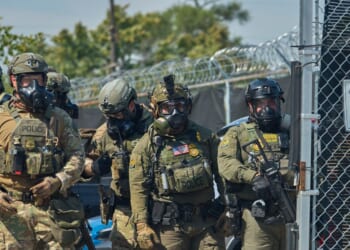 Protesters gather outside of the suburban Chicago ICE Detention Center in Broadview, Illinois, after a morning of violent confrontations between federal agents and activists on Sept. 19, 2025.