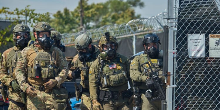 Protesters gather outside of the suburban Chicago ICE Detention Center in Broadview, Illinois, after a morning of violent confrontations between federal agents and activists on Sept. 19, 2025.