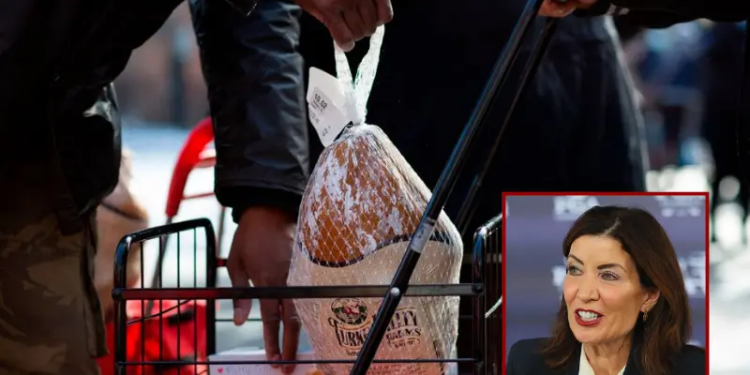 A Volunteer holds a turkey during a giveaway organized by Food Bank For New York City at Highbridge Houses in the Bronx on December 19, 2020 in New York. (Photo by Kena Betancur / AFP) (Photo by KENA BETANCUR/AFP via Getty Images) / New York Governor Kathy Hochul attends a press conference beside the Black Course at Bethpage State Park Golf Course on September 17, 2025 in Farmingdale, New York. The 2028 KPMG Women