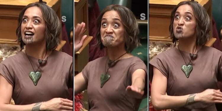 Oriini Kaipara, a member of New Zealand's parliament, performs a Māori ritual ceremony known as a haka during a parliamentary session.